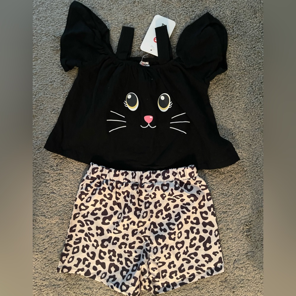 3t cat image on the shirt and cat shorts to match.